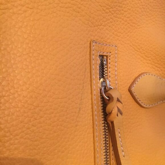 Dooney and Bourke leather pocket book. - Picture 4 of 8